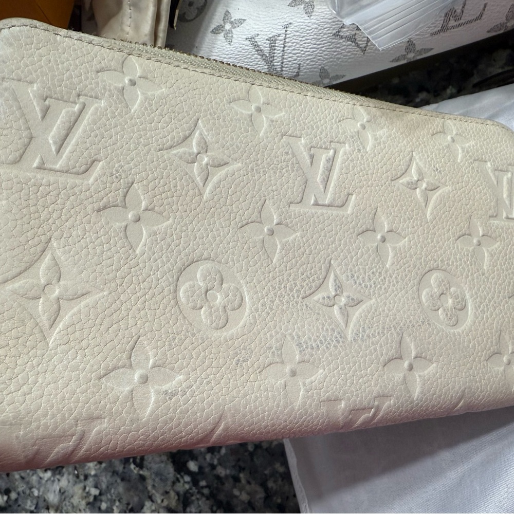 Louis Vuitton Impreinte beige Leather Wallet with Gold Zipper